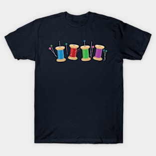 Colorful spools of thread pins needles sewing T-Shirt